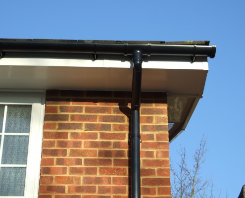 White UPVC Fascias and Ventialted Soffits with Black PVC Gutter and Downpipes