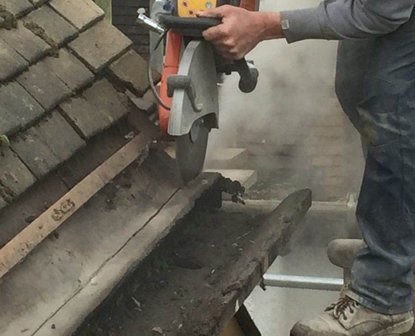 Cutting front section of Concrete Gutters