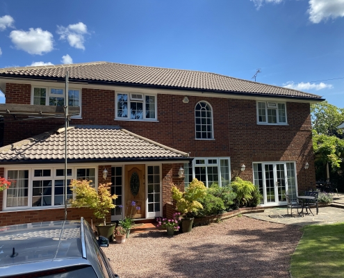 White Fascias and Soffits with Black Seamless Aluminium Gutters in Leatherhead Surrey 3