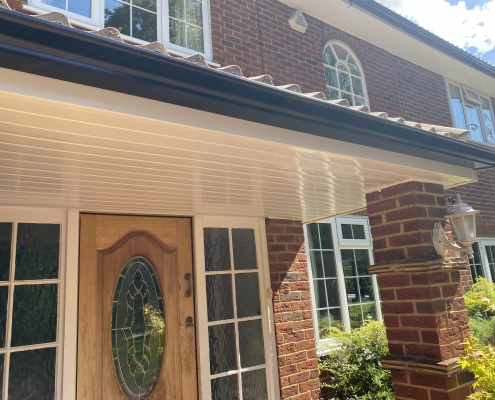 White Fascias and Soffits with Black Seamless Aluminium Gutters in Leatherhead Surrey 4